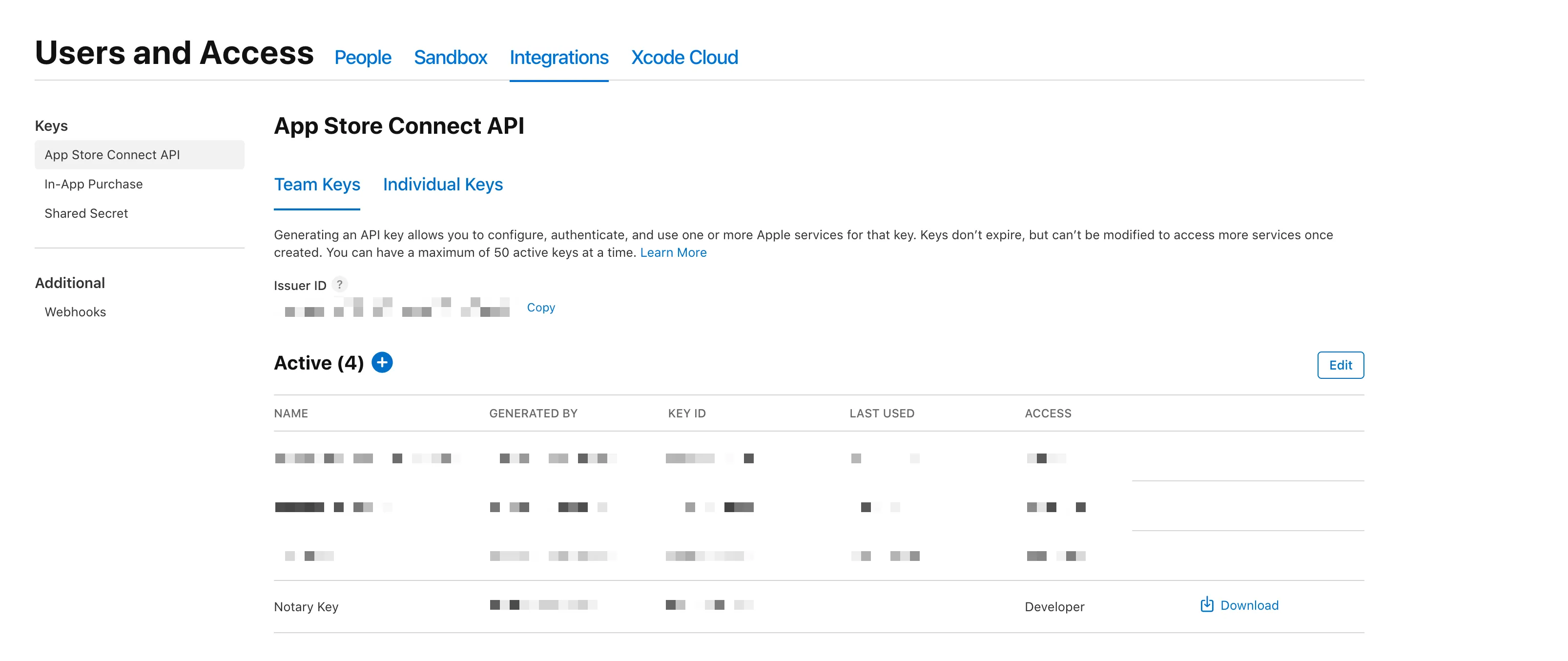 An image of the screen where you can create team API keys. On the top there is a section titled "Issuer ID," which a user can copy. Additionally, at the bottom there is an API key with the name "Notary Key." The key has the "Developer" role, has a key ID (blurred out for privacy), and on the right side there is a "Download" button which can be clicked to download the API key.